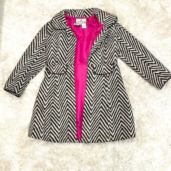 Girl feaux fur coat. 2 black buttons are missing on front. Bought at Saks. - Picture 1 of 2